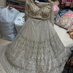 Golden whilte lehenga with unique work