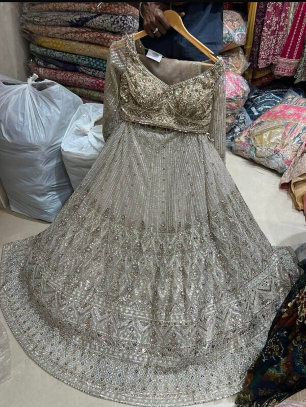 Golden whilte lehenga with unique work